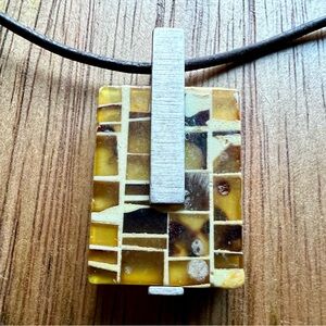 MCM necklace and earrings.